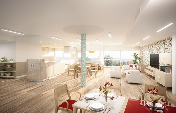 Aufenthaltsraum mit Wohnzimmer und küche.