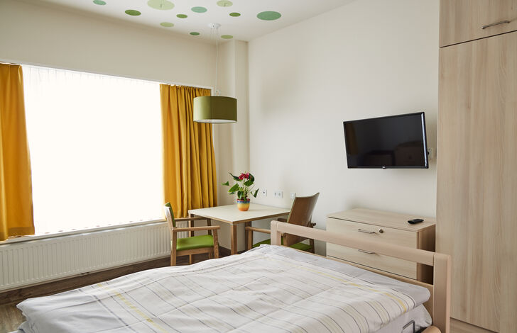 Ein Zimmer im Stadtheim.